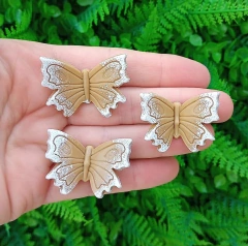 foto_24581_11269.jpg ENFEITES DE CUIA BORBOLETA SOMBRA BEGE - BOM CHIMA